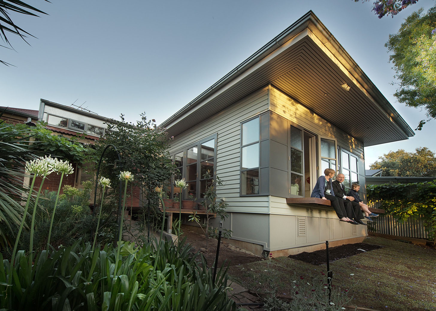 Family enjoying their John Adam Architects designed home